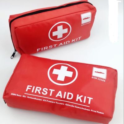 Venda a quente DIN 13164 Kit de primeiros socorros Fábrica OEM Carro Kit de primeiros socorros Kit de emergência Kit Vermelho Verde Kit de primeiros socorros